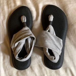 Never worn Sanuk sandals